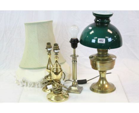 Brass Oil Lamp with Chimney and Green Glass Shade together with Three Brass Table Lamps