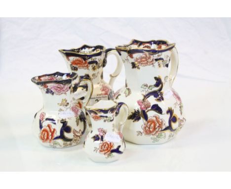 Four graduating Mason's Ironstone ceramic Hydra jugs in "Mandalay" pattern, the largest approx 16cm tall