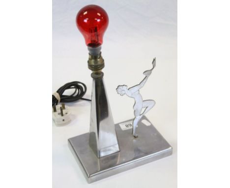 Art Deco Table lamp with Nude female Silhouette and all over Chrome finish, stands approx 23cm not counting the red glass bul