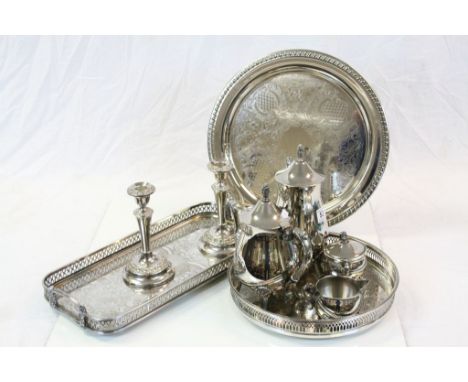 Collection of Silver Plate including Two Gallery Trays, another Tray, Four Piece Tea Service and Pair of Candlesticks