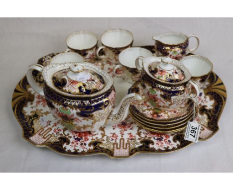 Matched Royal Crown Derby Imari 3788 tea service comprising tea pot, twin handled sugar bowl with cover, milk jug, five tea c