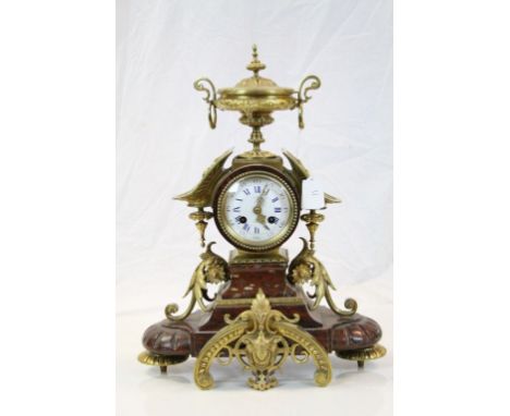 19th century French Rouge Marble and Brass Mantel Clock with 8 day movement