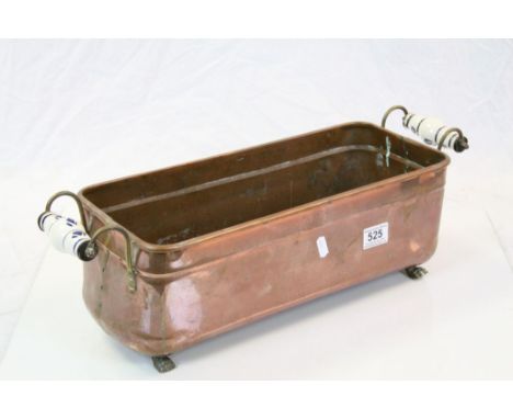 Copper Planter with Brass and Ceramic Handles and Brass Paw Feet, 57cms long together with a Large Gresley Mixing Bowl