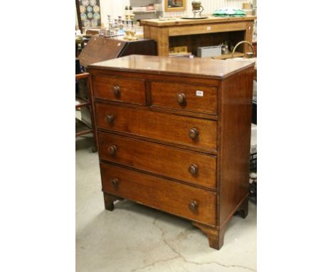 19th century Oak Chest of Two Short over Three Long Drawers with Turned Wooden Handles and raised on Bracket Feet, 94cms wide