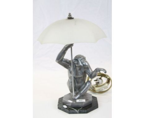 Art Deco Lamp with cast Aluminium Monkey with Umbrella glass shade and on an Octagonal Marble base, stands approx 43cm to top