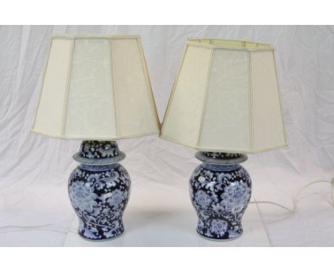 Pair of Blue and White Ceramic Table Lamps in the form of Chinese Lidded Jars, approx. 30cms high with Shades