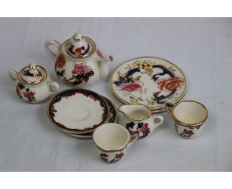 Miniature Masons Mandolay dolls house tea service comprising teapot, sugar bowl, milk jug, two cups and saucers and two sandw