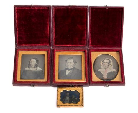 A family group of three daguerreotypes in red leather cases:, comprising individual portraits of a father, mother and daughte