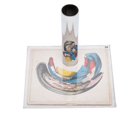 Four late 19th century French handcoloured lithograph anamorphic discs:, comprising a fireman, 16cm x 19.5cm, a drunk, 16.5cm