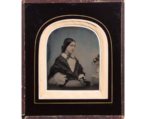 A mid 19th century  hand tinted ambrotype portrait of  Elizabeth Peel (nee Hanten):, photographer unknown, arched frame and p