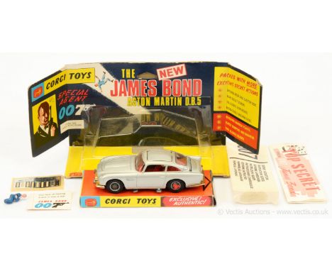 Corgi 270 "James Bond" Aston Martin DB5 finished in silver, red interior &amp; tyre slashers, with "James Bond &amp; Bandit" 