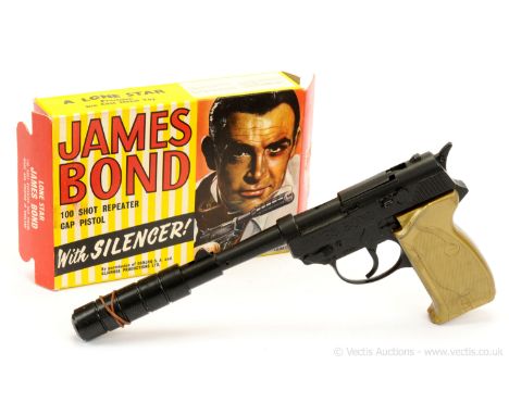 Lone Star - "James Bond" - 100 Shot Repeater Cap Pistol with Silencer - finished in black including silencer, gold butt - ove
