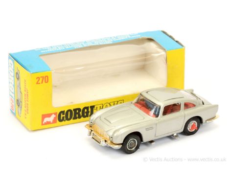 Corgi 270 - "James Bond" Aston Martin DB5 finished in silver, red interior and tyre slashers, with "James Bond &amp; Bandit "