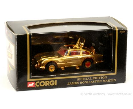 Corgi 96656 "James Bond" Aston Martin DB5 (1/43rd scale) - gold plated finish, red interior &amp; tyre slashers - Mint includ