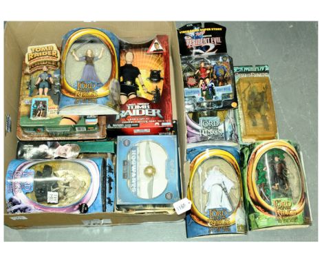 Toybiz a group of "Lord of the Rings" Figures including; Frodo; Gandalf the White; plus others; Playmates "Tomb Raider" - Lar