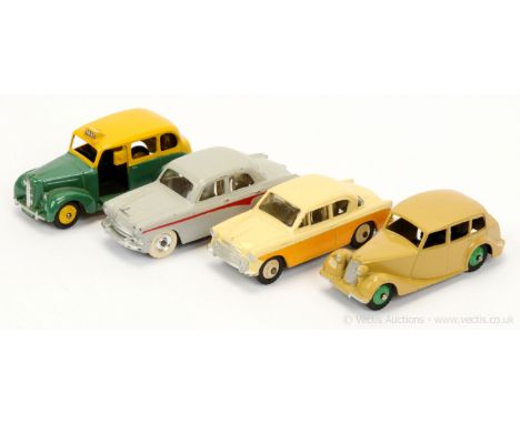 Dinky 40h Austin "Taxi" - two-tone green, yellow including ridged hubs with smooth tyres, black base interior and figure driv