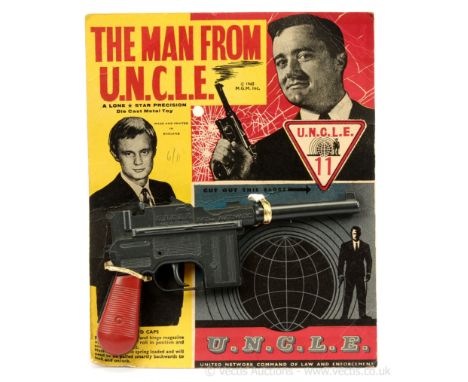 Lone Star (circa 1965) - "The Man from UNCLE" Cap Gun - finished in dark grey with red butt - overall condition appears to be