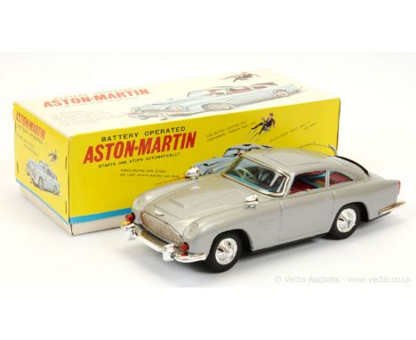 Gilbert (Japan) - "James Bond"- Large scale tinplate battery operated Aston Martin DB5 finished in silver, with "James Bond &