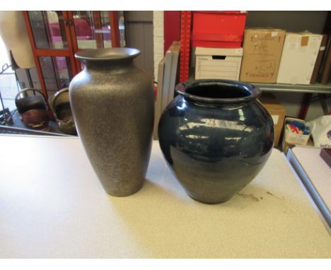 A Poole pottery speckled vase and another