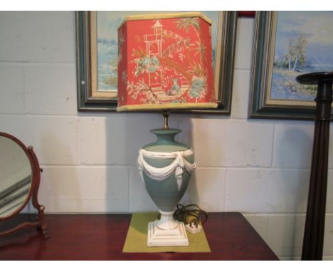 A table lamp of vase form with Chinoiserie shade