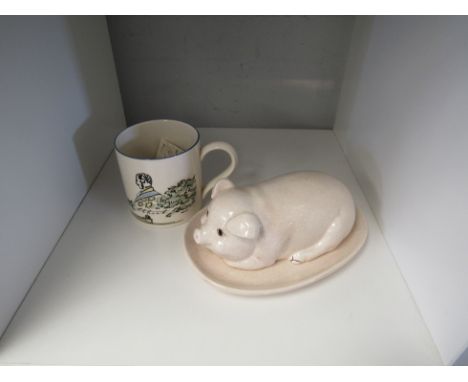 A Wedgwood Guyatt mug 1984 commissioned by the Observer for Prince Albert Exhibition, together with a ceramic pig butter dish
