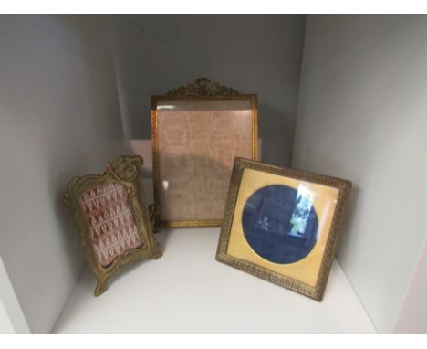 A brass Art Nouveau photograph frame and two others (3)