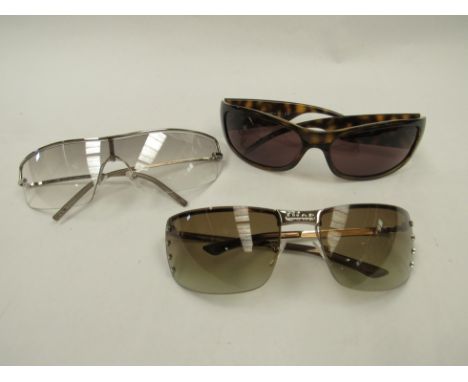 Three pairs of designer sunglasses, Gucci - GG 2683/5, Christian Dior - Adiorable 8 - 3YGK1 and Dolce &amp; Gabbana - DG6002