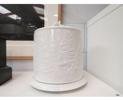 A white ceramic food dome/cover with fern leaf decoration 30cm tall x 16cm diameter   