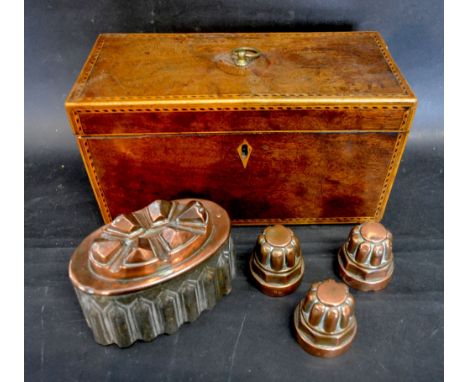 A 19th Century Inlaid Tea Caddy together with four early copper jelly moulds