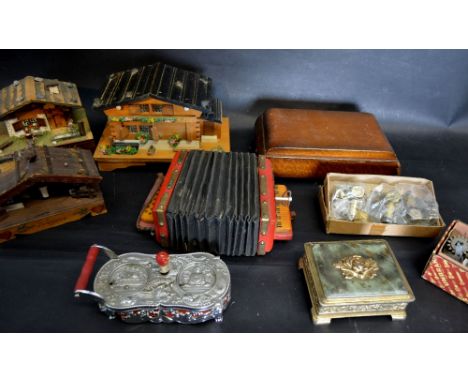 A Collection of Swiss Musical Boxes to include one in the form of an accordion and various movements and accessories