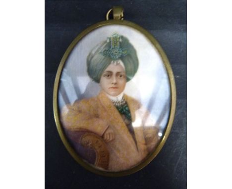 A Late 19th Century Oval Portrait Miniature, study of an Eastern boy with headdress, 8.5 x 6.5 cms