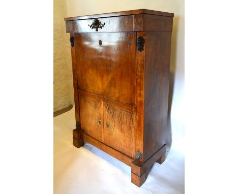 A 19th Century French Gilt Metal Mounted Secretaire Abattant with a frieze drawer above a fall front enclosing a fitted inter