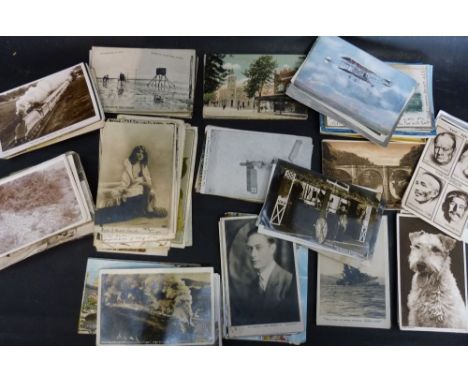 A Large Collection of Loose Postcards to include black and white topographical India trains, First World War and others