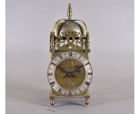 An early 20th Century French brass cased lantern clock, eight day, engraved dial, steel Roman chapter ring, pierced and engra