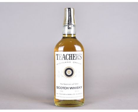 ANNOUNCE  It should be 26 2/3 fl ozsA bottle of Teacher's Highland Cream scotch whisky, 26? fl.ozs