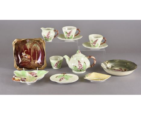 A Carlton ware tete-a-tete tea service, cabbage leaf design. Together with a Carlton 'Rouge Royale' square bowl, a Royal Doul