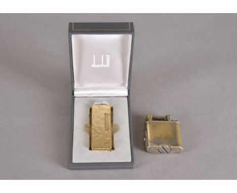 A gold plated Dunhill 'Rollagas' lighter, in box. Together with a lift-arm short rectangular example (2) 