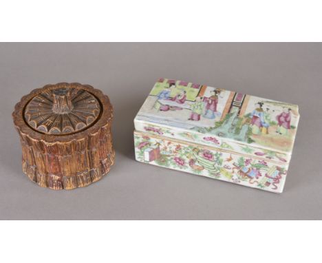 A Chinese famille rose porcelain box, 18.5 cm wide (af). Together with a ceramic tobacco jar in the form of bundles of wood (