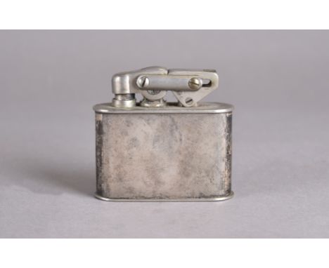 An Art Deco sterling marked table top lighter, engine turned decoration, with inscription 'Presented to Reginald Beale by Non