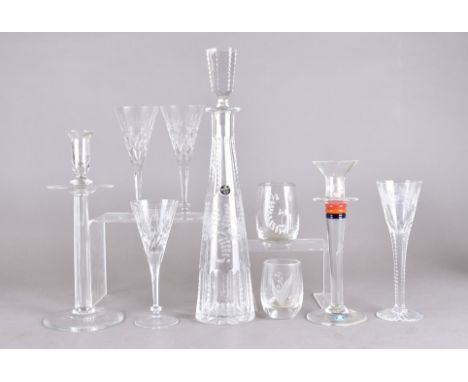 A Stephens crystal glass decanter with stopper and glass, the decanter tapered faceted form and flared rim, hexagonal stopper