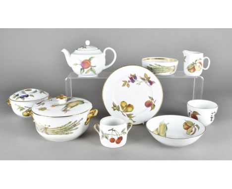 A quantity of Royal Worcester Evesham china, including tureens and covers, casserole dishes and covers, dinner plates, cups e