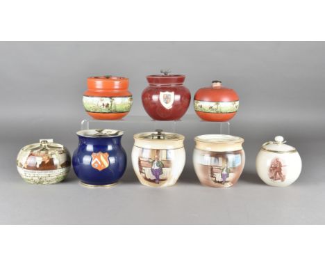 A collection of 20th Century tobacco jars, including a Royal Doulton jar printed with monks, two Clifton jars printed with sc