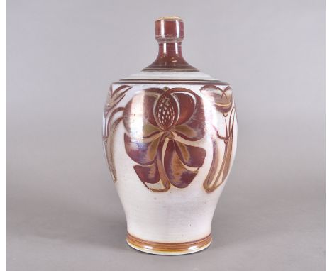 An Aldermaston terracotta lamp base with red lustre floral decoration by Edgar Campden, signed to base, 36 cm high 