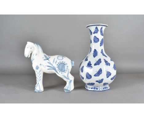 A David Sharp rye pottery model of a ceramic horse, together with a vase decorated with printed butterflies (2) 