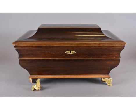 A French empire style sarcophagus shaped casket in rosewood,  satinwood strung inlay, elm banding, ormolu mounts, bracket fee
