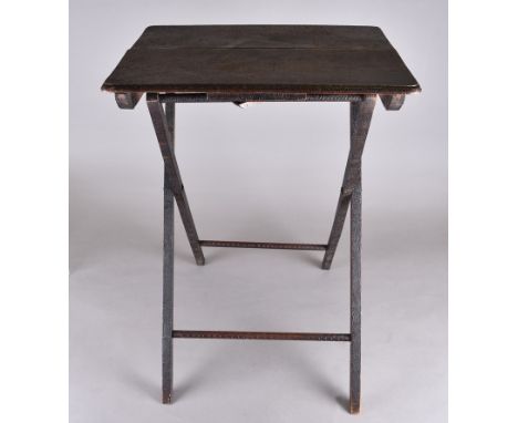 A pokerwork folding table of Irish interest, centred with a harp, surrounded by clovers, 50 cm x 37 cm  
