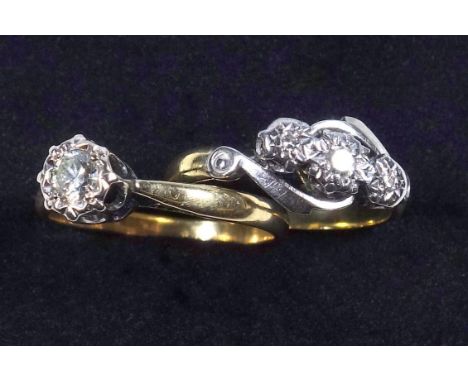 An illusion set three stone diamond ring on 18 ct band, size H and similar single stone ring size K,&nbsp;4.6 grams gross.