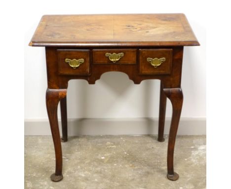 Georgian walnut lowboy, with cross banding, three drawers with brass handles and engraved back plates, H. 68.5cm, W. 69cm, D.
