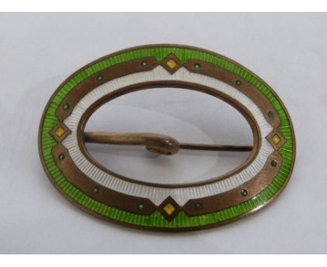A guilloche enamel buckle brooch. 2¼'' wide