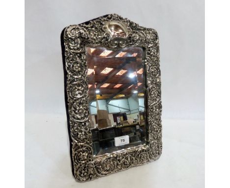 A silver plated strut mirror of recent manufacture, with bevelled plate. 15'' high. Bears an erroneous hallmark